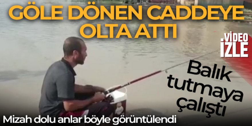 Ankara'nın Keçiören ilçesinde bir vatandaş etkili olan sağanak yağış sebebiyle göle dönen caddede balık tutmaya çalıştı.